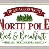 New North Pole Bed and Breakfast 15" x 21.5" Framed Christmas Wall Decor Art Print Sign Poster in a White Wooden Frame with UV Acrylic and Hangers Wall