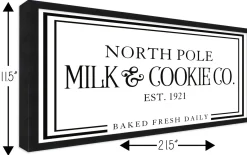 North Pole Milk and Cookie Company 11.5" x 21.5" Framed Christmas Wall Decor Sign Poster in a Black Wooden Frame with UV Acrylic and Hangers Wall