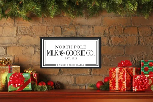 North Pole Milk and Cookie Company 11.5" x 21.5" Framed Christmas Wall Decor Sign Poster in a Black Wooden Frame with UV Acrylic and Hangers Wall