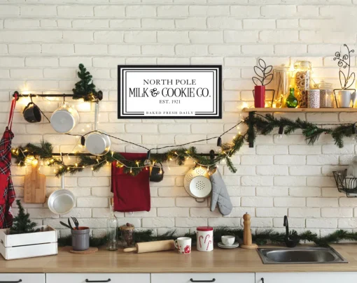 North Pole Milk and Cookie Company 11.5" x 21.5" Framed Christmas Wall Decor Sign Poster in a Black Wooden Frame with UV Acrylic and Hangers Wall