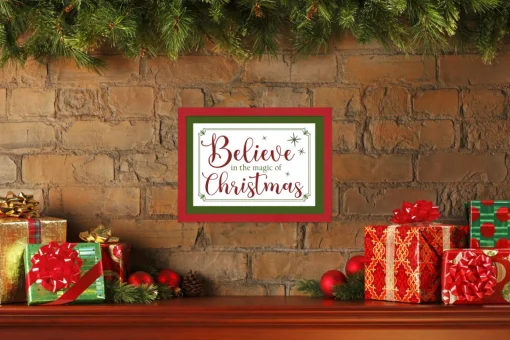Red and Green Believe in the Magic of Christmas 12.5" x 16.5" Framed Christmas Wall Decor Sign Poster in a Natural Wooden Frame with UV Acrylic Wall